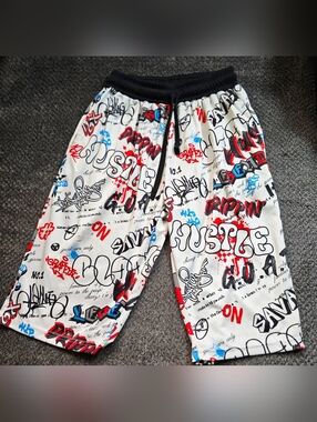 Phat Farm long shorts featuring an all-over graffiti print with bold Y2k Hip Hop